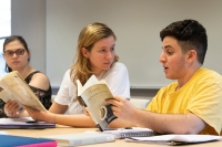 graduate students engaged in class discussion