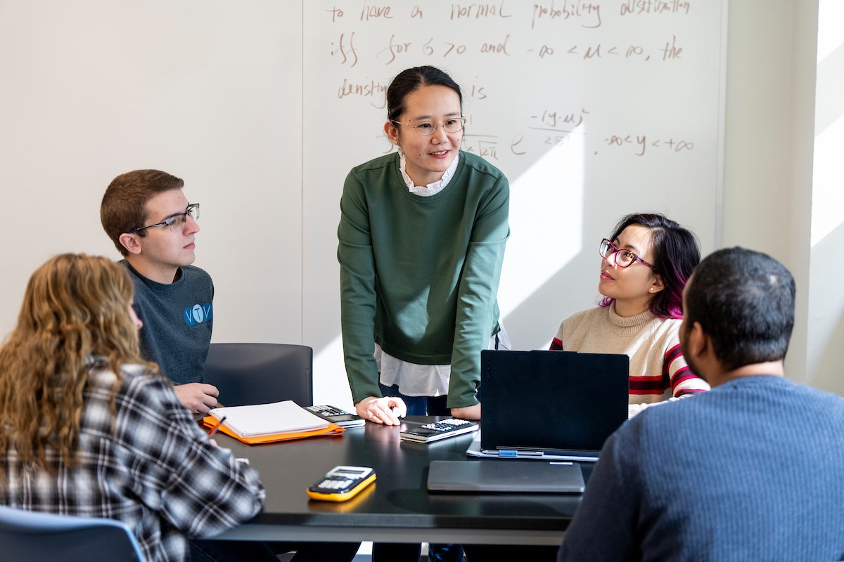 Villanova students and instructor in a classroom.