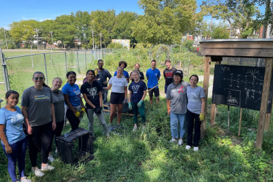 Student Volunteers Taking Part in Hunger and Homelessness Awareness Week Pose for a Photo