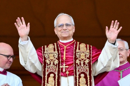 Pope Leo XIV, a Villanova graduate and Augustinian friar, waves to the crowds in St. Peter's Square after being  introduced as the 267th Pope. 