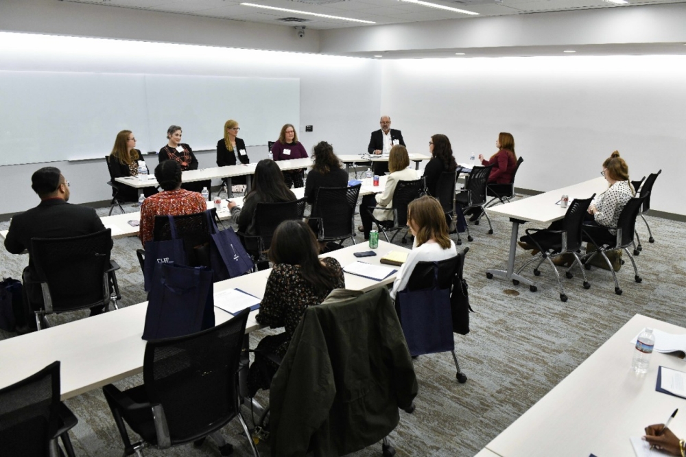 A group of students attending a networking event