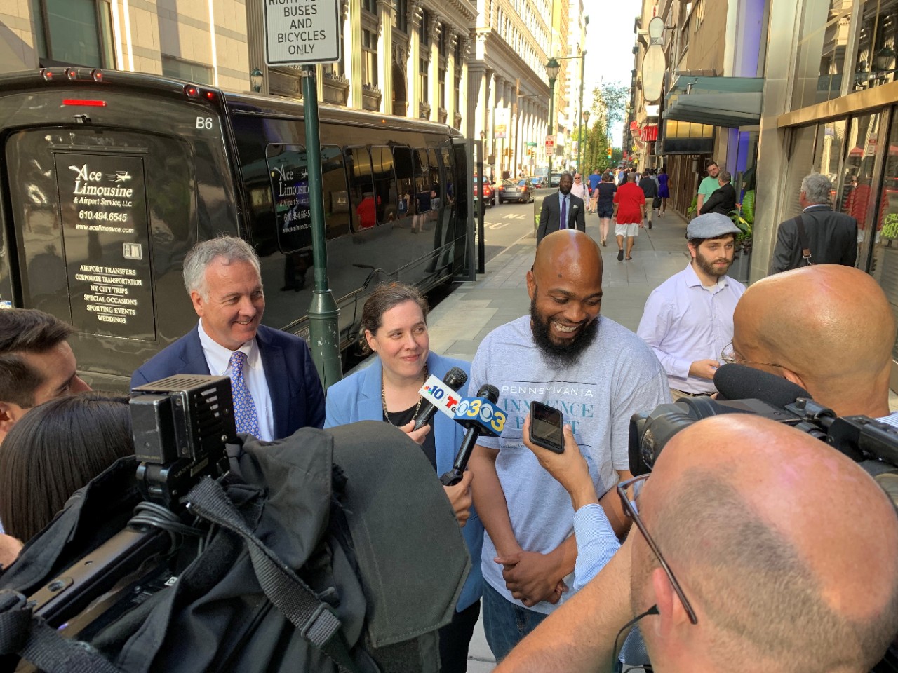 Tom Gallagher, Hannah McPhelin and John Miller, a free man.