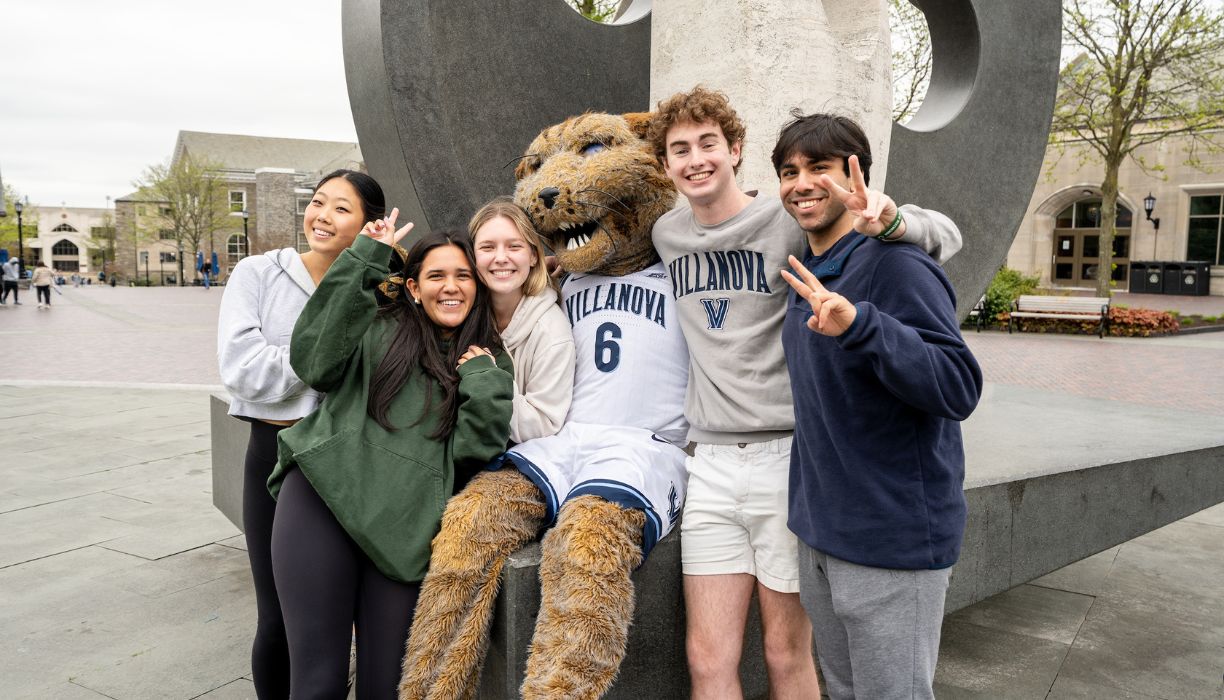 Students posing in front of the Oreo with Will D. Cat.