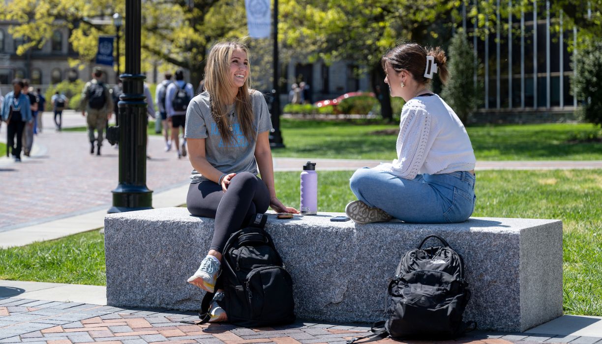 Students taking a selfie with Will D. Cat.